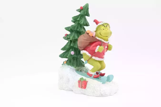 grinch with a christmas tree