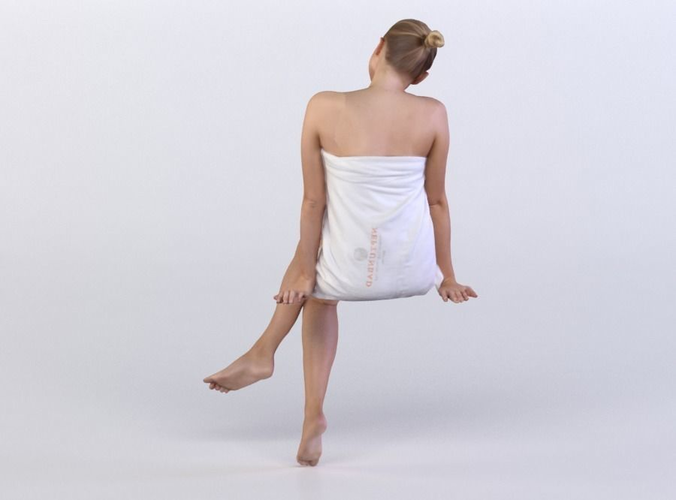 Carina 002 blonde woman sitting with the towel 