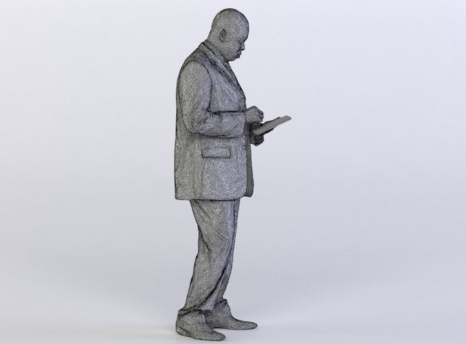 Business Man 0319 in a Suit Using a Tablet