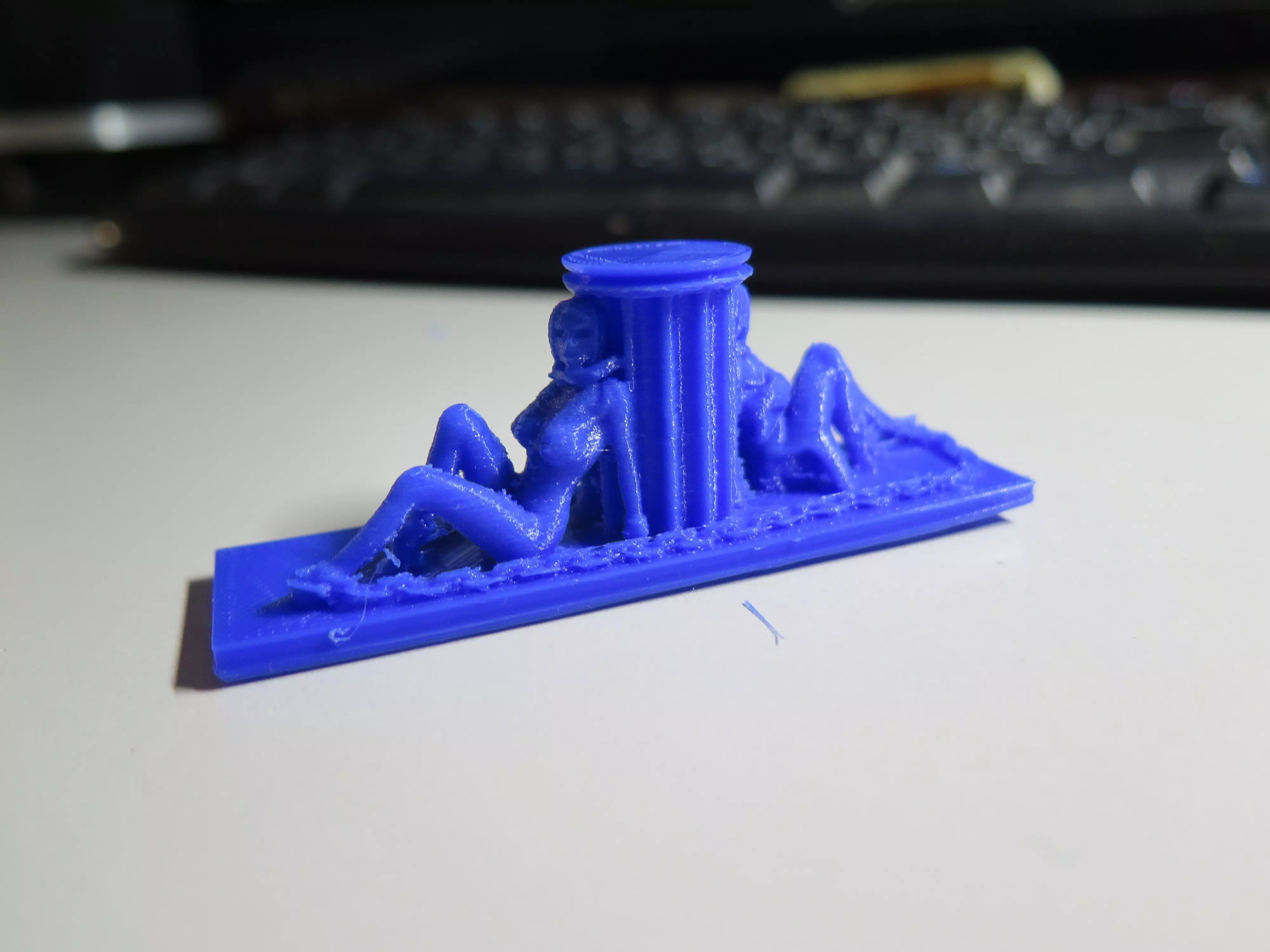 Chainedslaves figurine on desk 3D print model_0