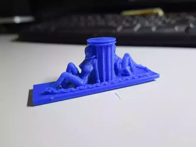 Chainedslaves figurine on desk