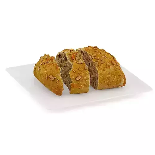 Sliced Dark Bun on White Plate