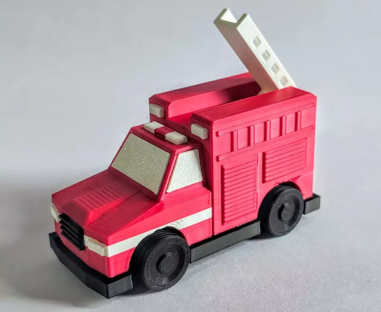 3d printed fire truck multicolor with rotating wheels and ladder 3D print model