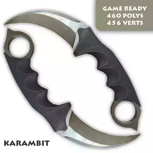 Karambit knife on grassy field
