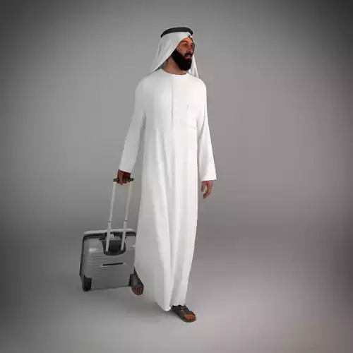 Traditional arab man from dubai posed walking w trolley