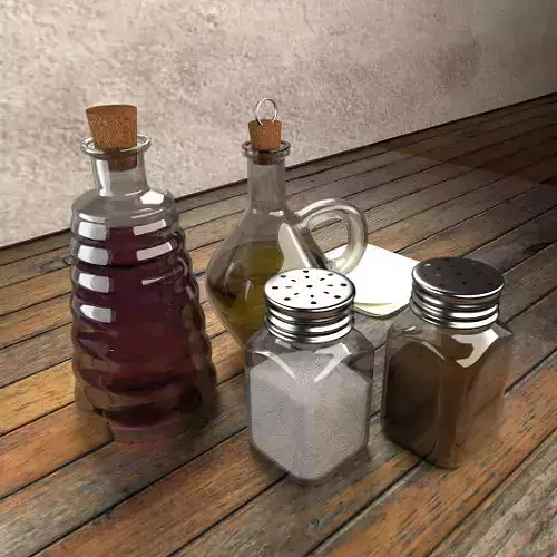 oil-and-vinegar three glass bottles on wooden table