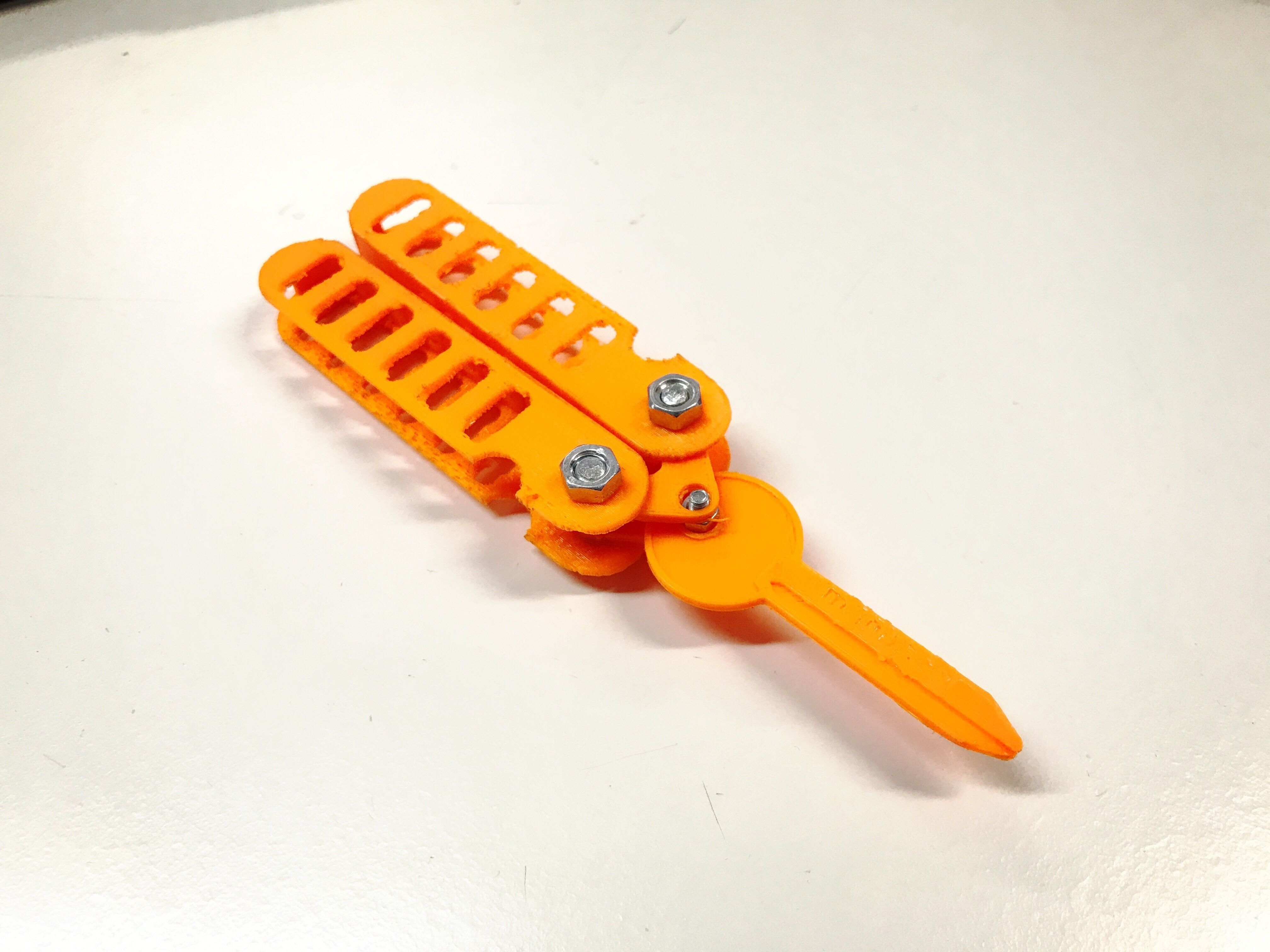 Butterfly-Schluesselmappe orange plastic key holder on table 3D print model_3