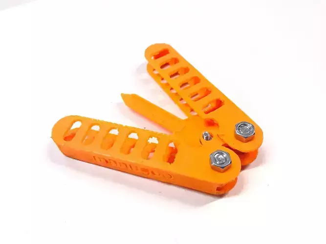 Butterfly-Schluesselmappe orange plastic key holder on table