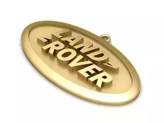 Trinket gold land rover logo