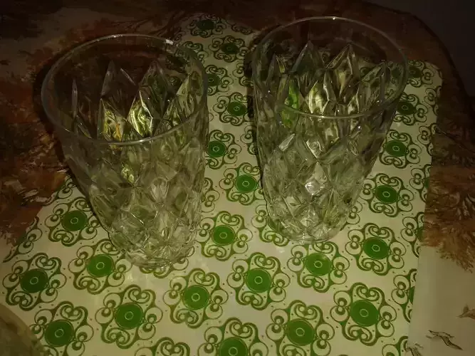A Cup two glasses on tablecloth 3D print model