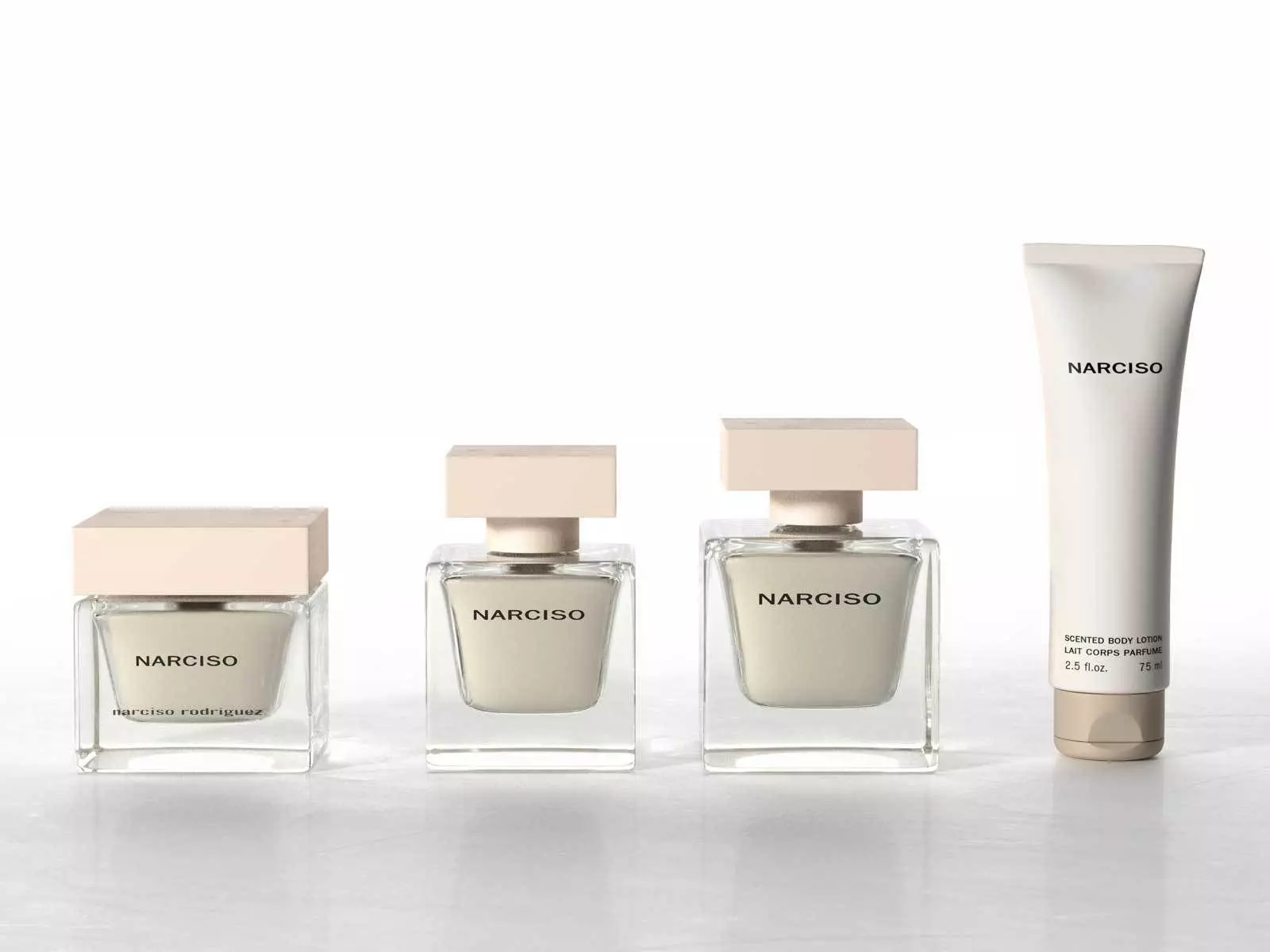 Fragrance Collection three bottles of perfume and tube of cream 3D model_0