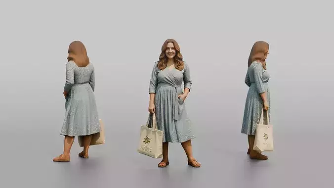 Woman Posing in a Wrap Dress Holding a Canvas Bag