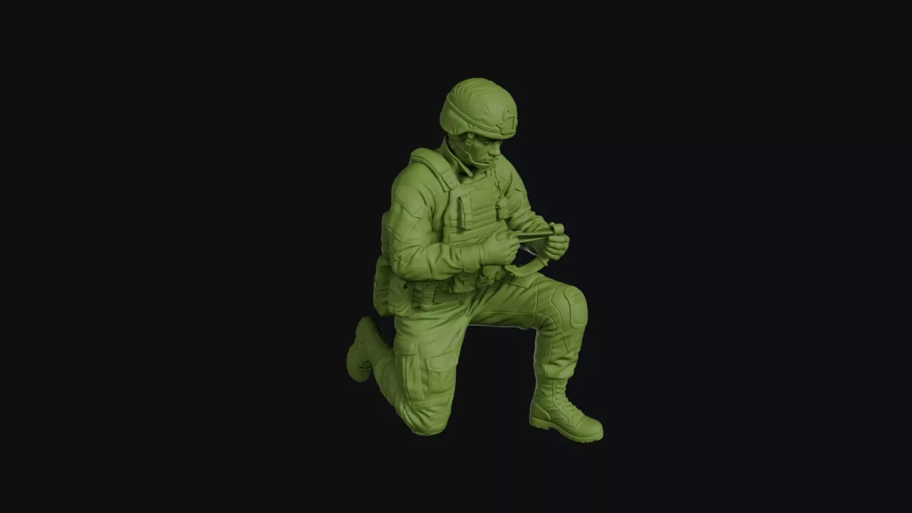 Modern combat medic kneeling with a tourniquet in his hands 3D print model