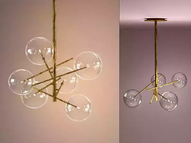 Bolle brass chandelier with glass bubbles hanging from it