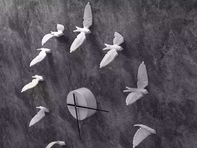 Swallow clock made of paper birds