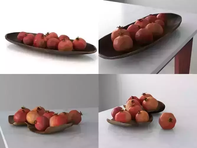 Pomegranate pomegranates in bowl on table