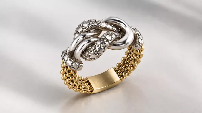 small Diamond cut gold finish knot mesh ring with support