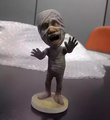 Mummy figurine of on table 3D print model