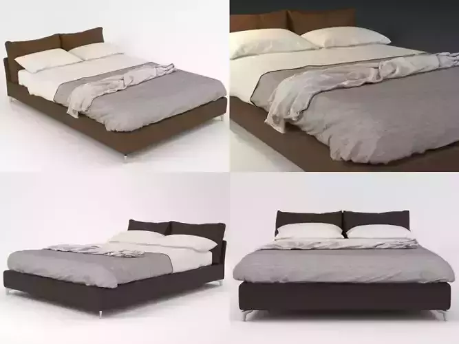 O bed with two pillows and blanket
