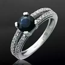 ring with blue round sapphire and diamonds