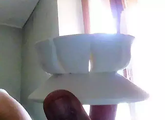 bougeoir person holding cup