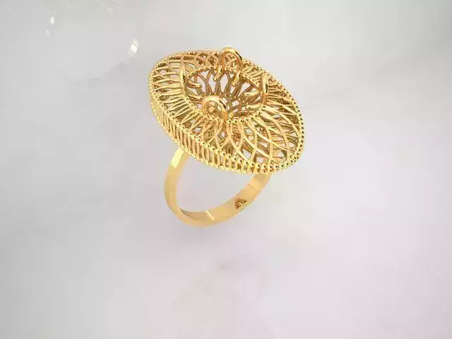 An 04 gold ring with intricate design