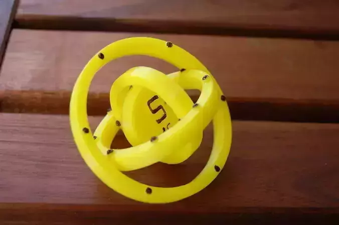 Sulfur spherical toy on wooden table