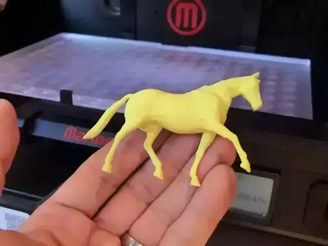 3D printed toy horse figure two halves
