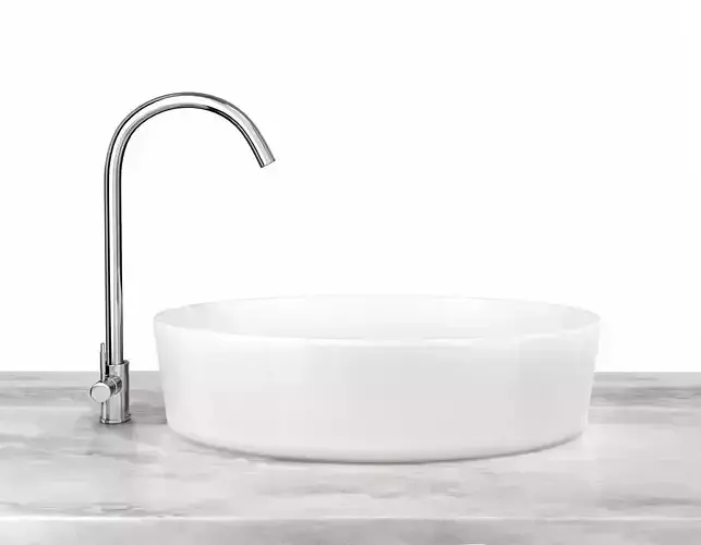 Ceramic Sink and Chrome Faucet