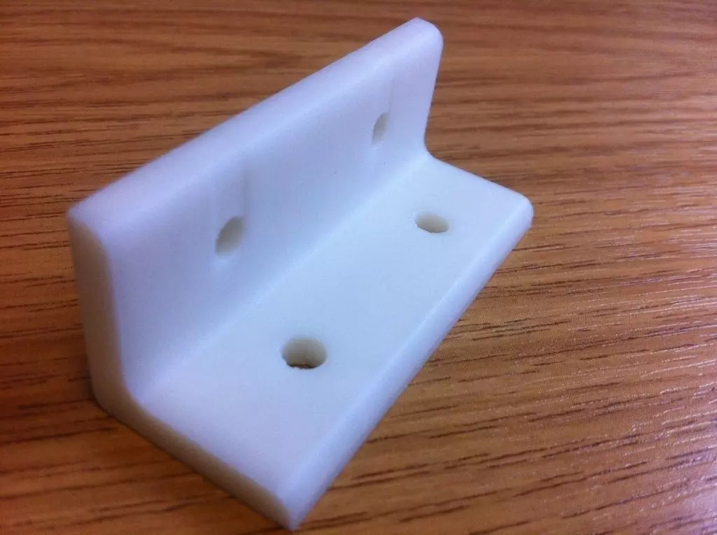 L Bracket plastic on wooden table Free 3D print model_0