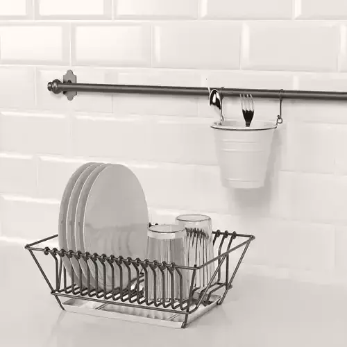 Kitchen set stainless steel dish rack on tiled wall