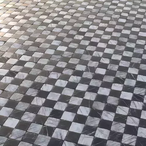Aged marble black and white chequered tiles