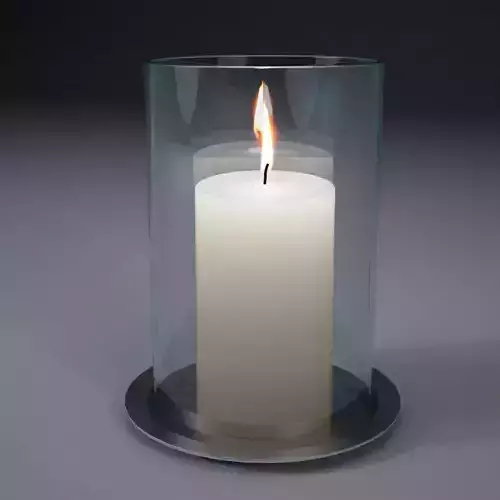 White candle in glass jar