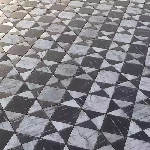 Aged black and white marble tiles