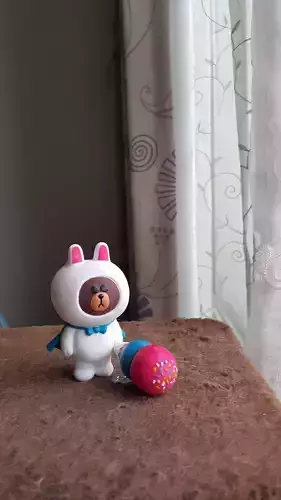 The Bear bunny figurine with ball