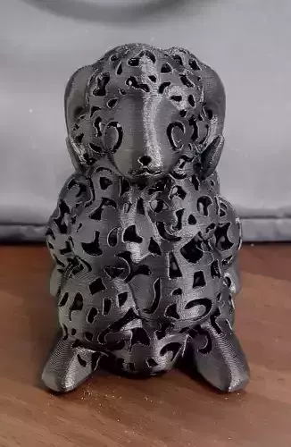 The Goat figurine on table