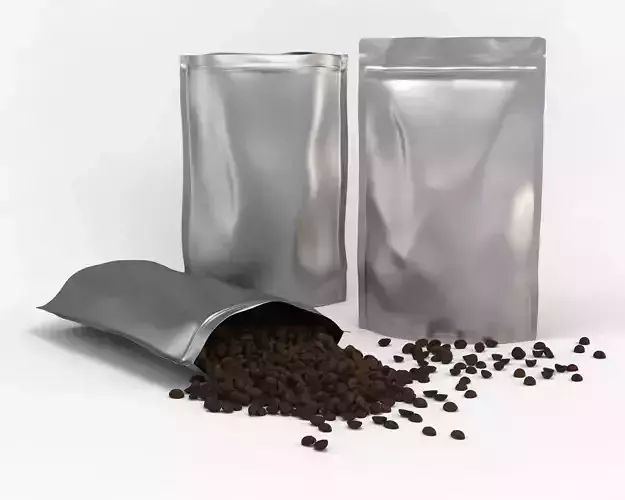 Coffee plastic pouch and scattered coffee beans