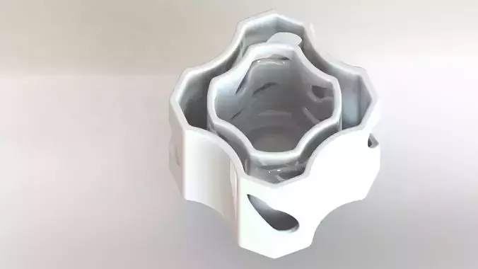 Matruz vase with holes in it