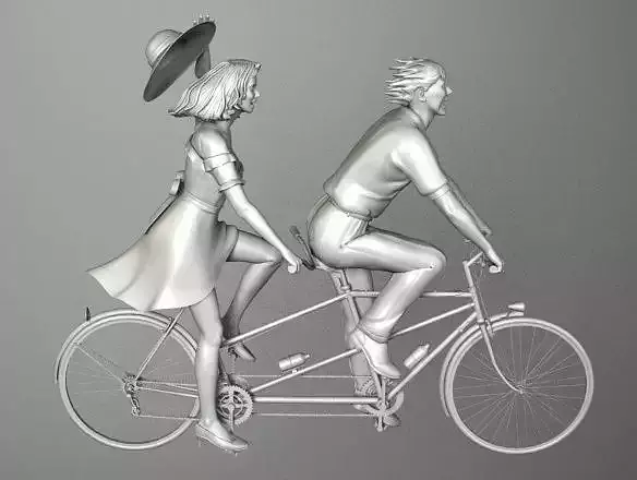 TANDEM couple riding bicycle