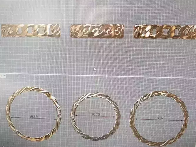 3d model jewelry set of gold rings on computer screen