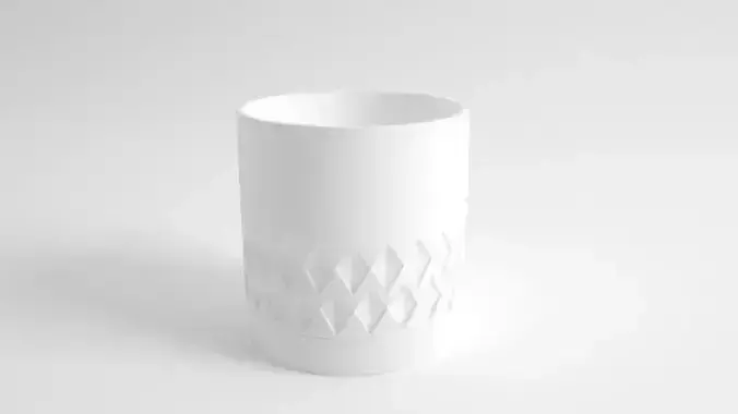 Cup with carved in motifs