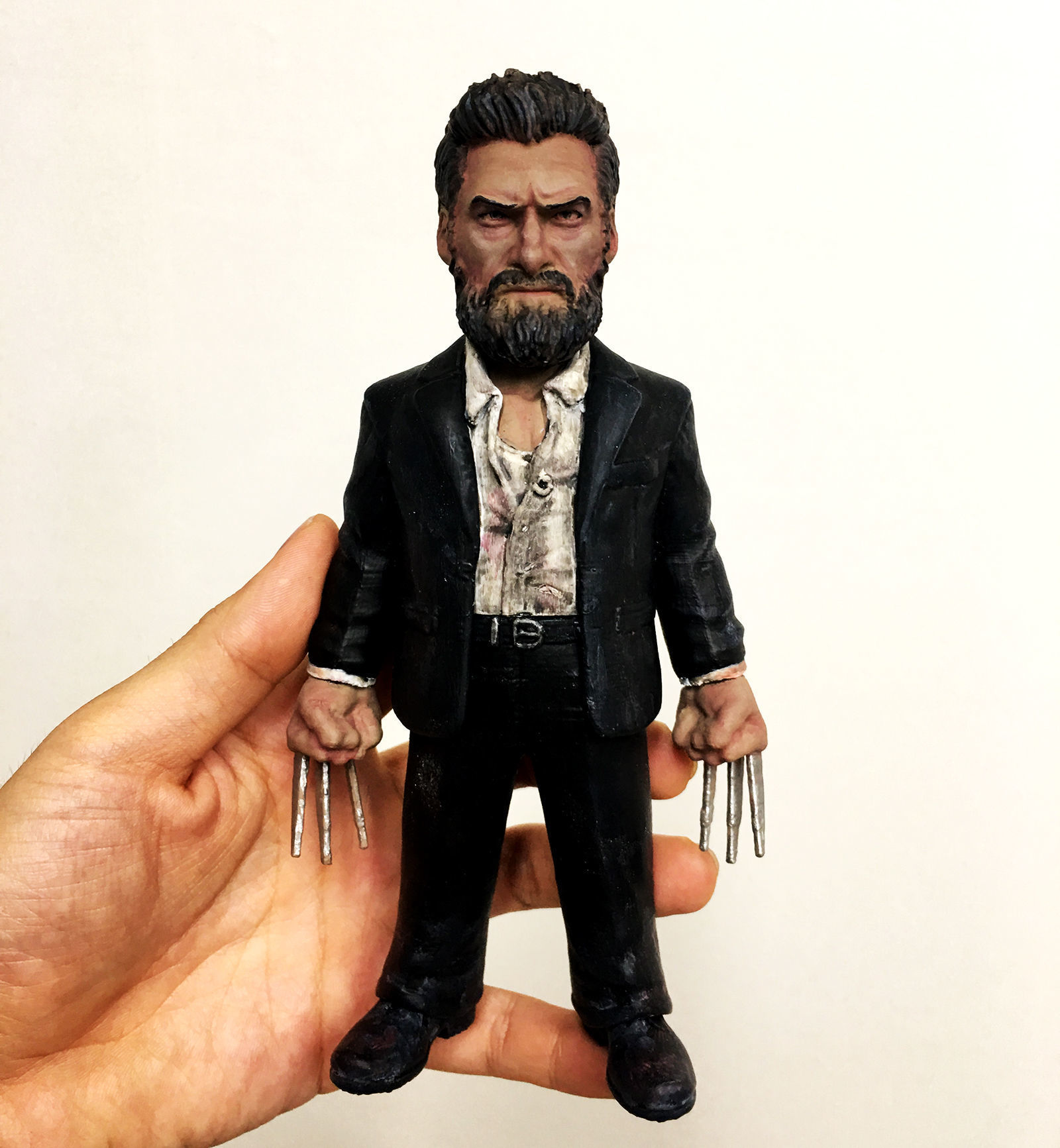 LOGAN 3D print model wolverine action figure in hand 3D print model_3