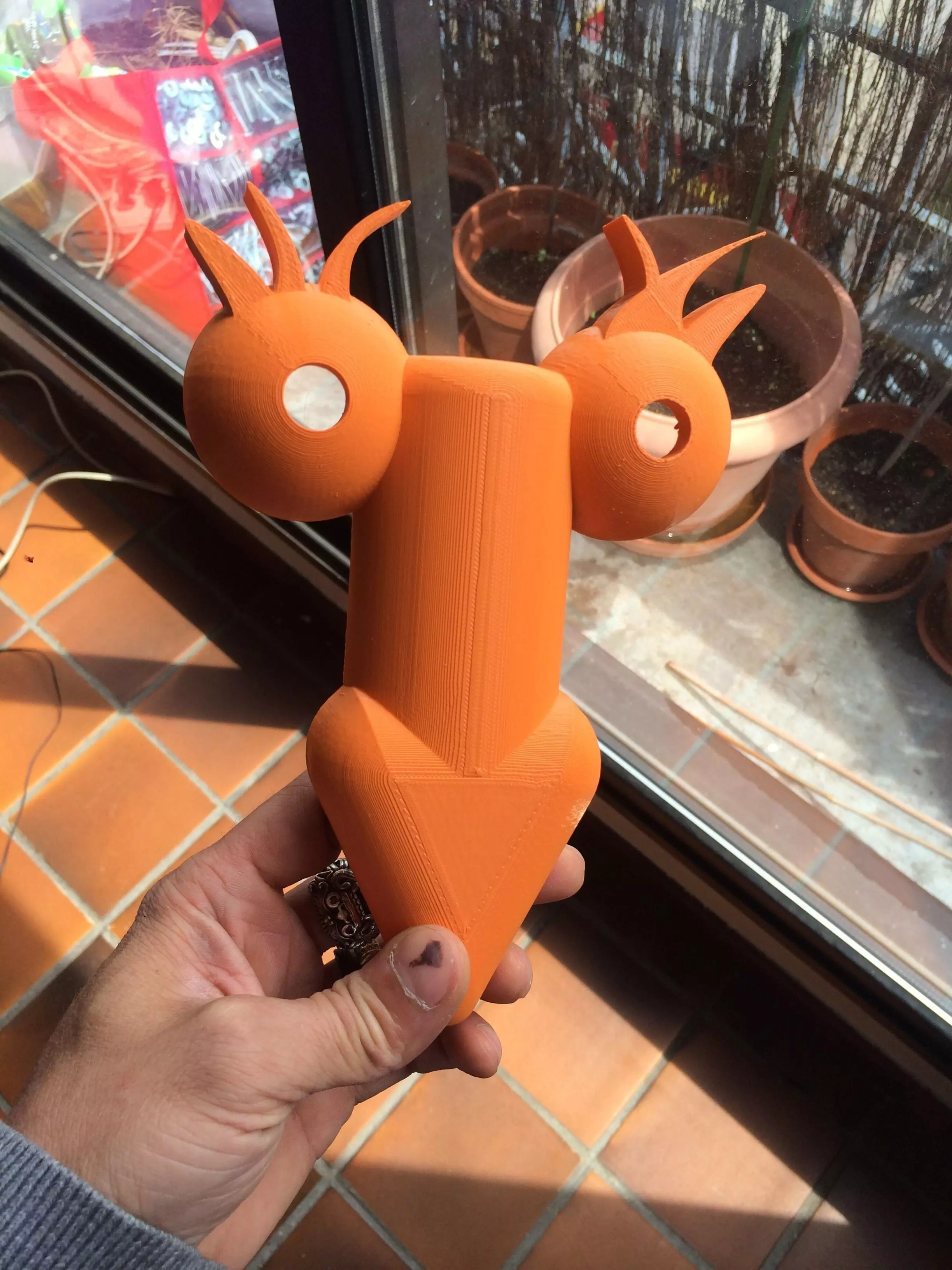 Jarkodick person holding orange creature 3D print model_0