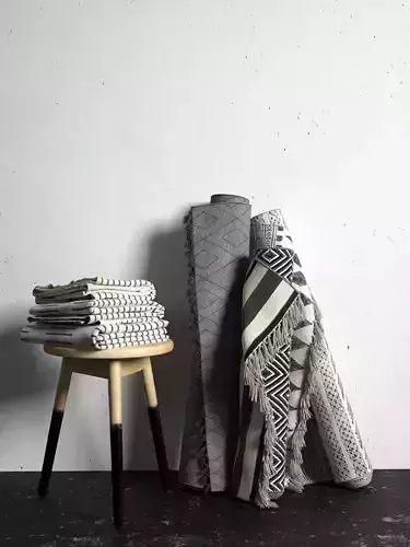 Stool and Aztec Rugs